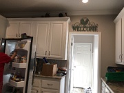 13-Looking thru laundry rm to master bath door from kitchen